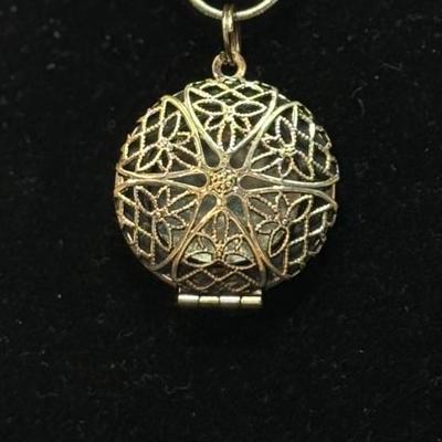 Antique style filigree copper pendant/ locket on spinner