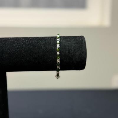 Green stone and white diamond bracelet