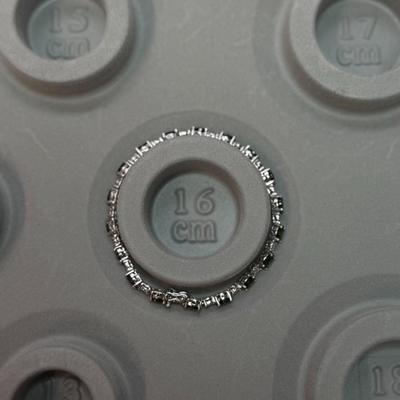 Green stone and white diamond bracelet