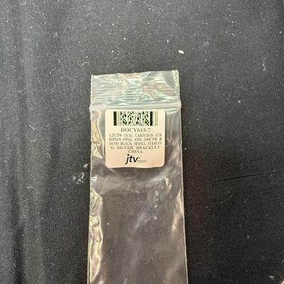 6.25CTW Oval Cabochon Eth opal and 3CTW Round Black Spinel Sterlin (925)