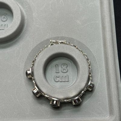 Sterling silver bracelet with multicolored stone