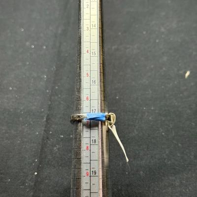 sterling silver ring featuring a large, oval-cut citrine gemstone