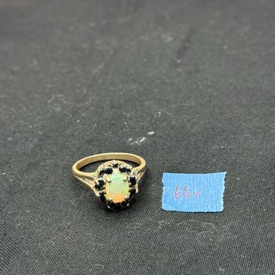 Mother of pearl with black gemstone clusters