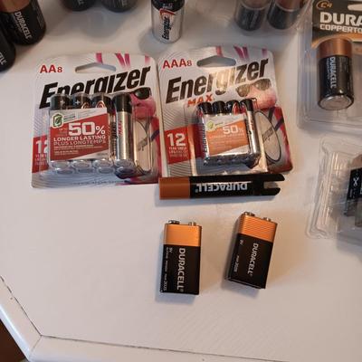 AN ASSORTMENT OF BATTERIES