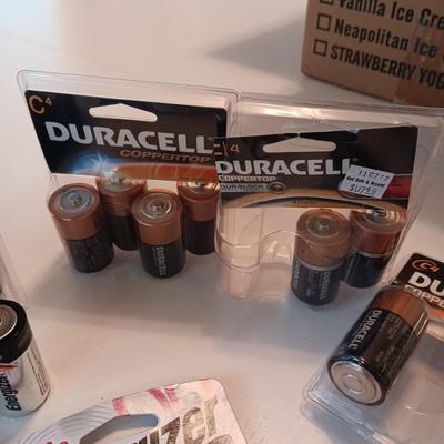 AN ASSORTMENT OF BATTERIES