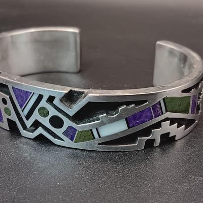 STERLING SILVER BRACELET WITH PURPLE, GREEN AND WHITE STONES MARKED "AC" 73.27g