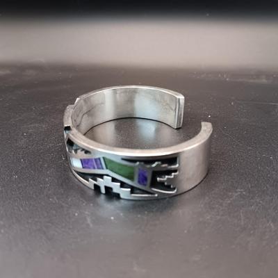 STERLING SILVER BRACELET WITH PURPLE, GREEN AND WHITE STONES MARKED "AC" 73.27g