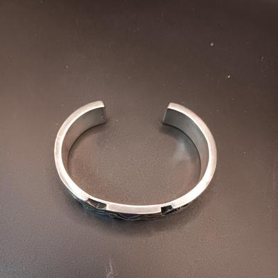 STERLING SILVER BRACELET WITH PURPLE, GREEN AND WHITE STONES MARKED "AC" 73.27g