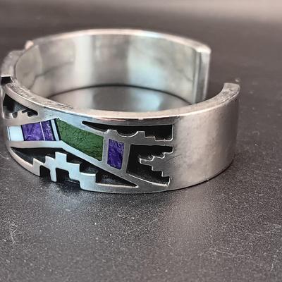STERLING SILVER BRACELET WITH PURPLE, GREEN AND WHITE STONES MARKED "AC" 73.27g