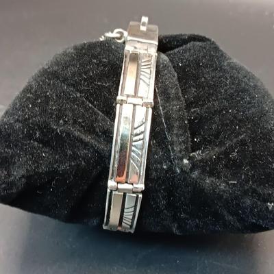 14K AND STERLING SILVER LINKED BRACELET MARKED "Calvin" 23.44g