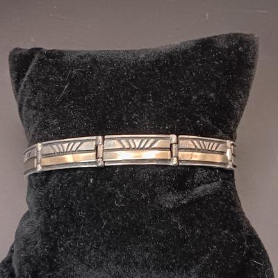 14K AND STERLING SILVER LINKED BRACELET MARKED "Calvin" 23.44g