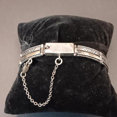 14K AND STERLING SILVER LINKED BRACELET MARKED "Calvin" 23.44g