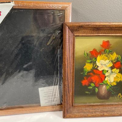 Paintings and framed decor in tote