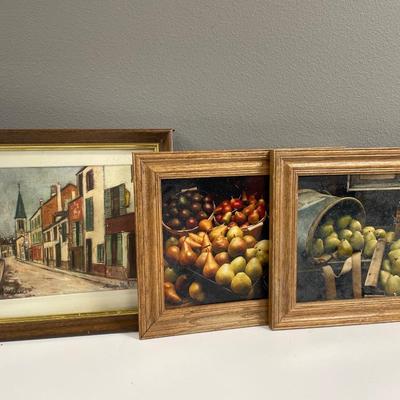 Paintings and framed decor in tote