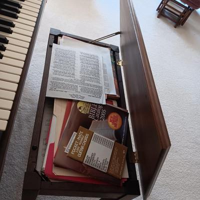 HAMMOND ORGAN WITH ALL THE BELLS AND WHISTLES, PIANO LIGHT AND A BENCH PLUS A LOT OF SHEET MUSIC