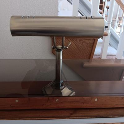 HAMMOND ORGAN WITH ALL THE BELLS AND WHISTLES, PIANO LIGHT AND A BENCH PLUS A LOT OF SHEET MUSIC
