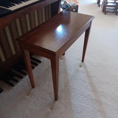 HAMMOND ORGAN WITH ALL THE BELLS AND WHISTLES, PIANO LIGHT AND A BENCH PLUS A LOT OF SHEET MUSIC