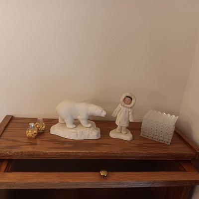 A POLAR BEAR AND ESKIMO MADE WITH ALASKA PORCELAIN AND GOLD FLAKES AND COASTERS