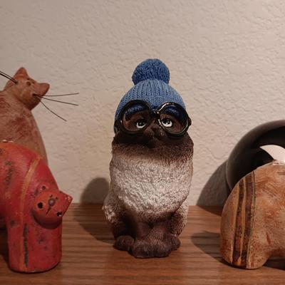 A COLLECTION OF CAT FIGURES