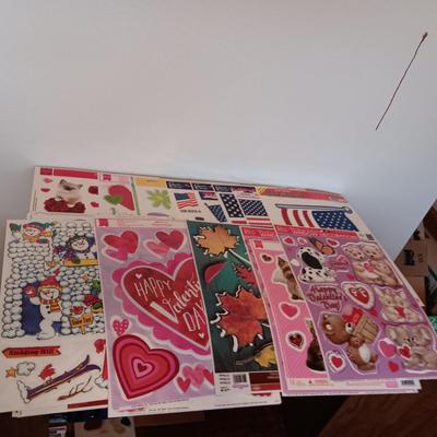 A LARGE GROUP OF VARIOUS WINDOW CLINGS