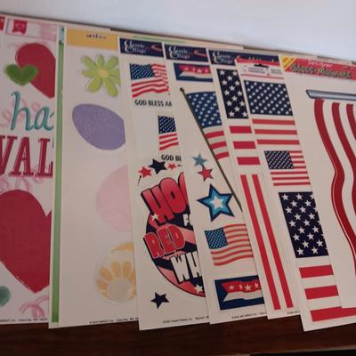 A LARGE GROUP OF VARIOUS WINDOW CLINGS