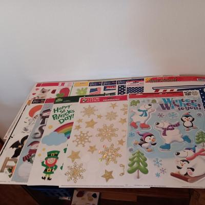 A LARGE GROUP OF VARIOUS WINDOW CLINGS
