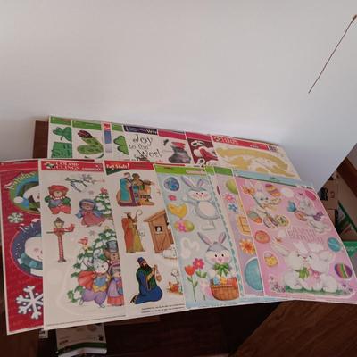 A LARGE GROUP OF VARIOUS WINDOW CLINGS