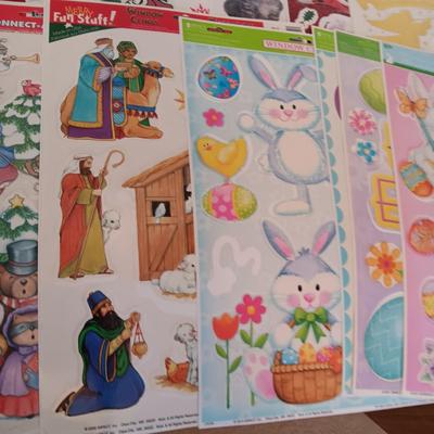 A LARGE GROUP OF VARIOUS WINDOW CLINGS