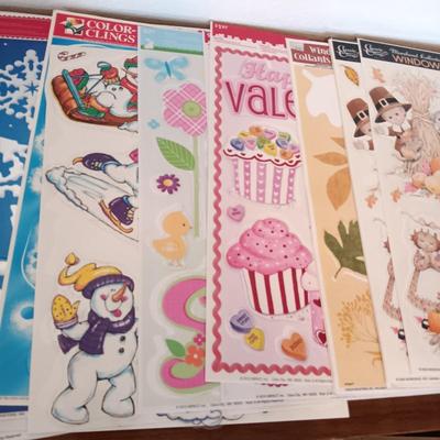 A LARGE GROUP OF VARIOUS WINDOW CLINGS