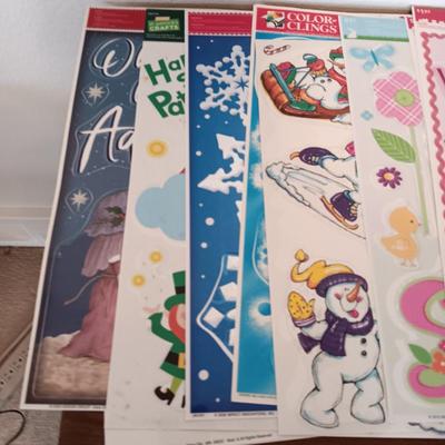 A LARGE GROUP OF VARIOUS WINDOW CLINGS