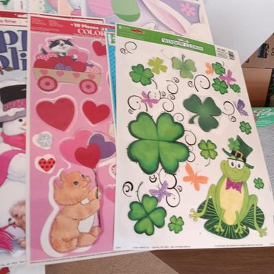 A LARGE GROUP OF VARIOUS WINDOW CLINGS
