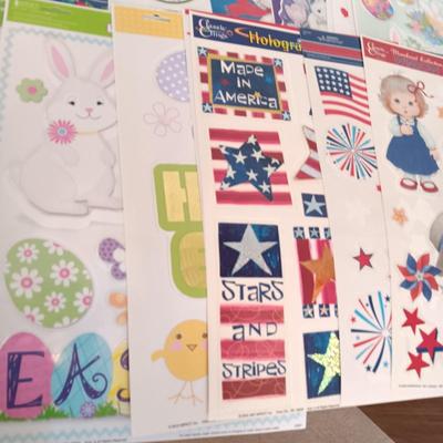 A LARGE GROUP OF VARIOUS WINDOW CLINGS
