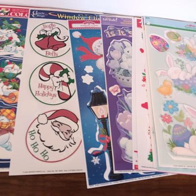 A LARGE GROUP OF VARIOUS WINDOW CLINGS
