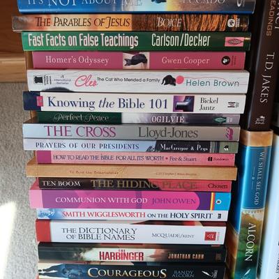 WOODEN BOOKSHELF WITH SOME BOOKS ON RELIGION