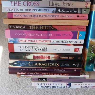 WOODEN BOOKSHELF WITH SOME BOOKS ON RELIGION
