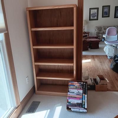 WOODEN BOOKSHELF WITH SOME BOOKS ON RELIGION