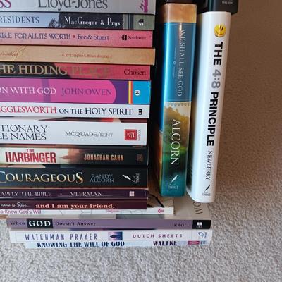 WOODEN BOOKSHELF WITH SOME BOOKS ON RELIGION