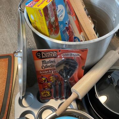 Miscellaneous kitchen pots pans, strainers, cutting boards