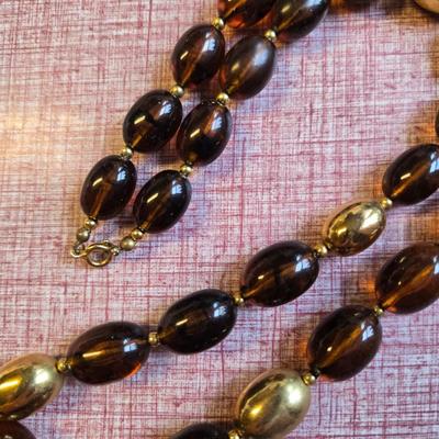 Topaz/brown and Lilac bead necklaces