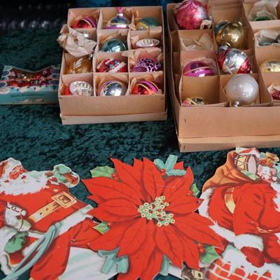 VINTAGE CHRISTMAS ORNAMENTS TWO BOXES OF NINE PLUS/ VINTAGE SANTA PAPER CUT OUT DISPLAY