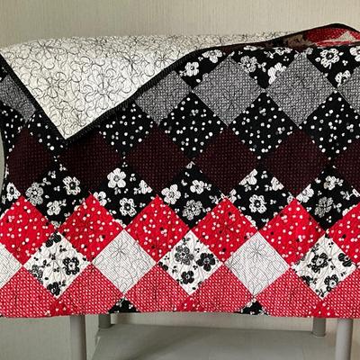Quilted red/black blanket full size