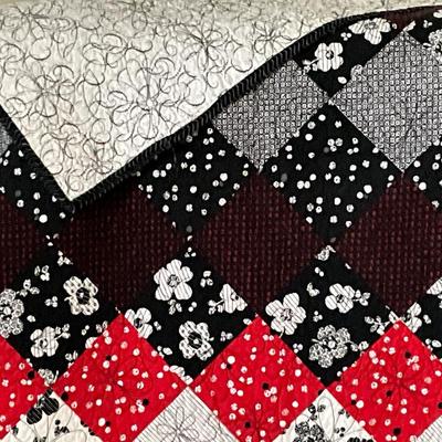 Quilted red/black blanket full size