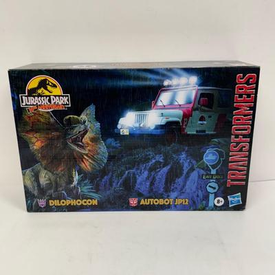 LOT 81: Jurassic Park/Transformers Crossover Toys