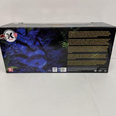 LOT 95: Hasbro Jurassic Park/ Transformers Crossover Toy