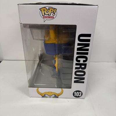 LOT 102: Transformers Variety Package: Funko Pop, Lunch Box and Various Toys