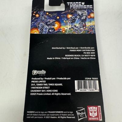 LOT 102: Transformers Variety Package: Funko Pop, Lunch Box and Various Toys