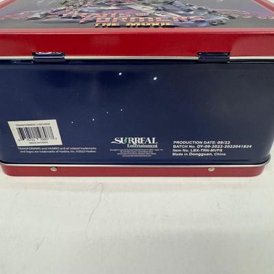 LOT 102: Transformers Variety Package: Funko Pop, Lunch Box and Various Toys