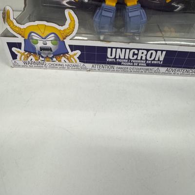 LOT 102: Transformers Variety Package: Funko Pop, Lunch Box and Various Toys