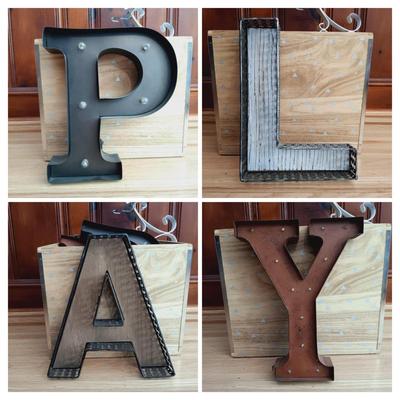 LOT 38: Bin Full of Porch Decor and More Featuring Stainless Steel Umbrella Holder and Umbrellas, Metal Letters that Spell PLAY, Wooden...