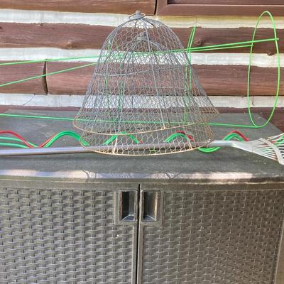 LOT 58: Outdoor Garden Storage Cabinet and Gardening Tool Supplies and Tomato Cages